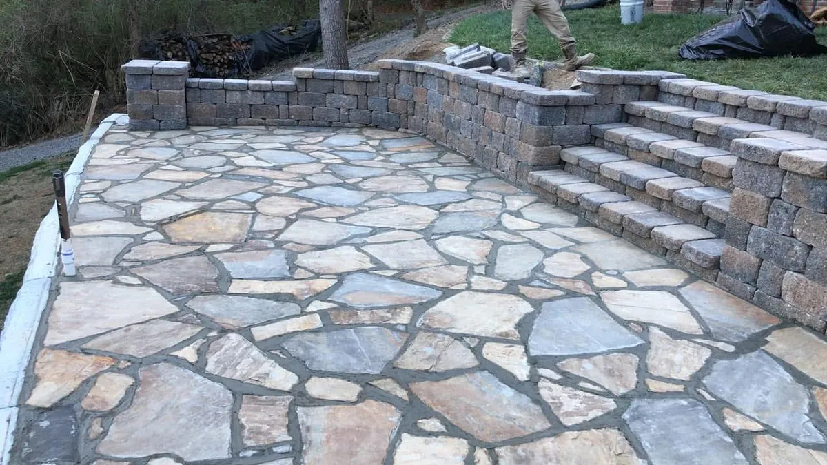 Flagstone patio with seating wall